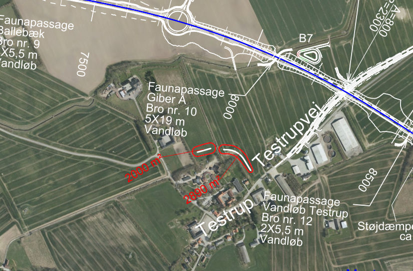 Kortudsnit ved Testrup og Testrupvej med to røde, buede arealer syd for vejen.